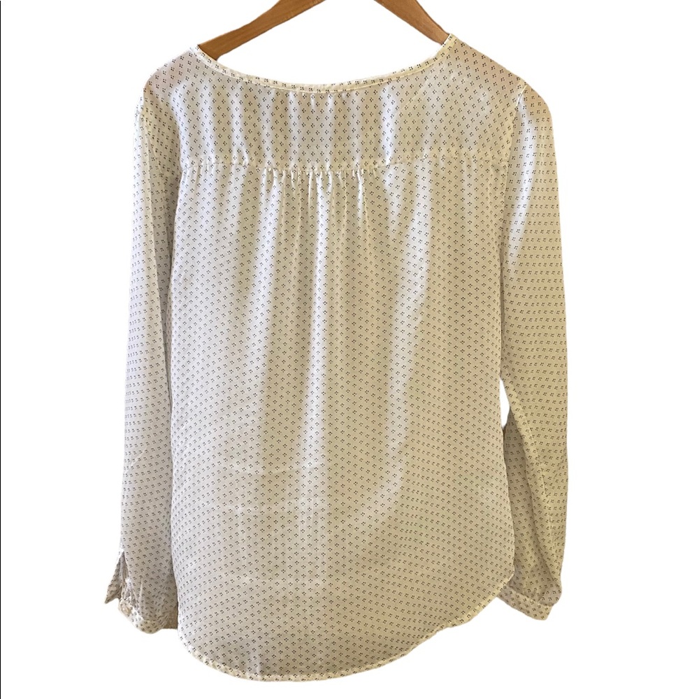 Relaxed fit , signs of wear but still good .  See photos for more details